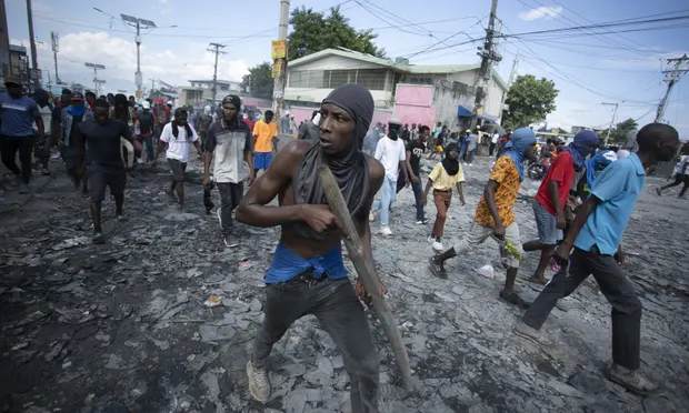 Protesters demanding the resignation of Ariel Henry in Port-au-Prince, Haiti, on 3 October 2022. Photograph: Odelyn Joseph/AP